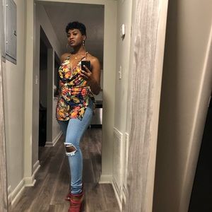 Multi colored low cleavage top